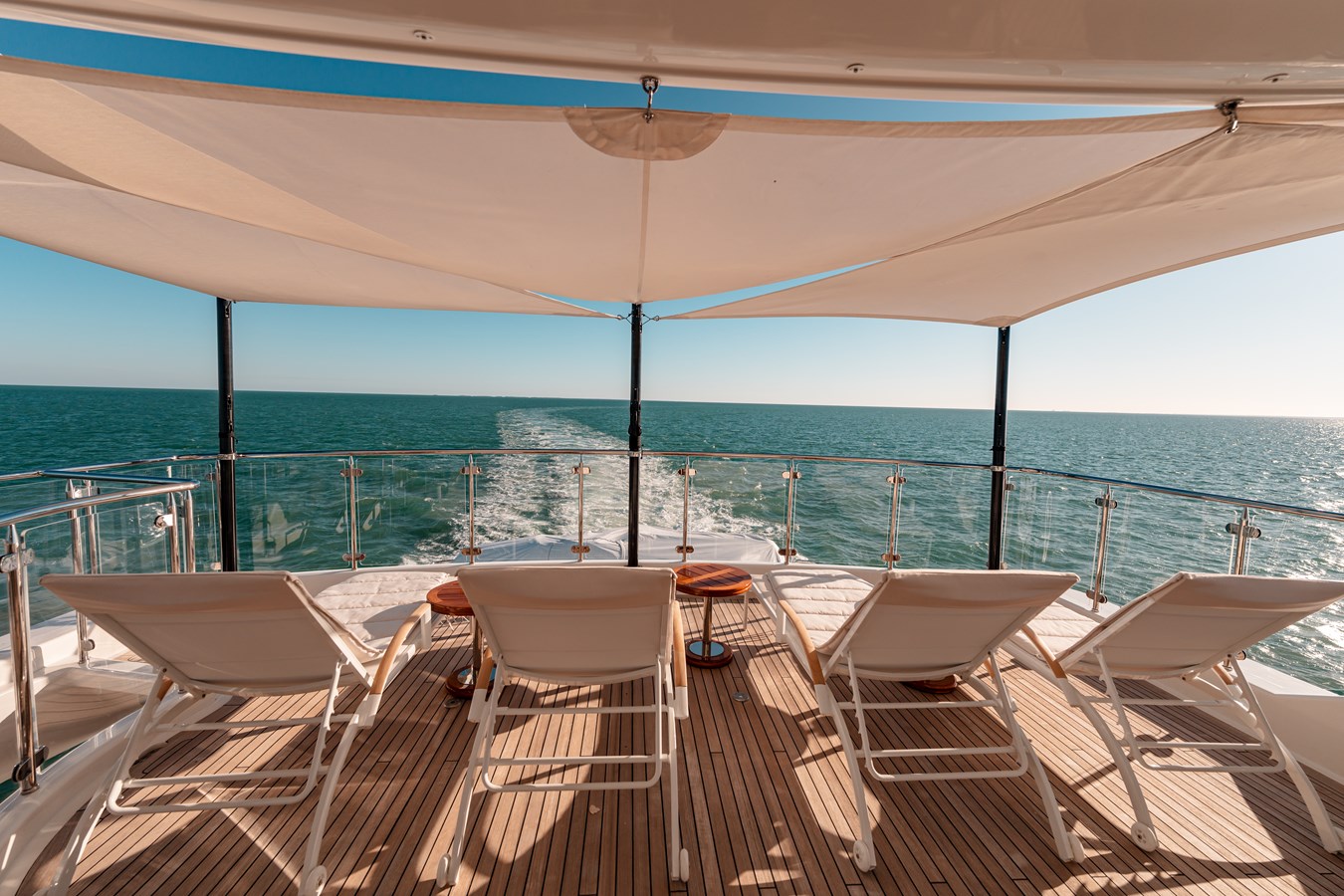 Westport 130 Blue Time boat deck dining area with teak flooring