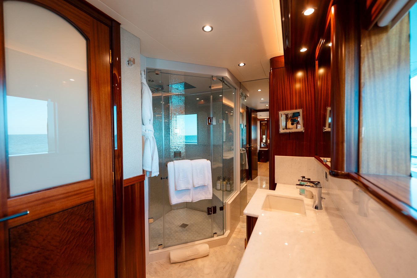 Westport 130 Blue Time master bathroom marble shower with ocean view
