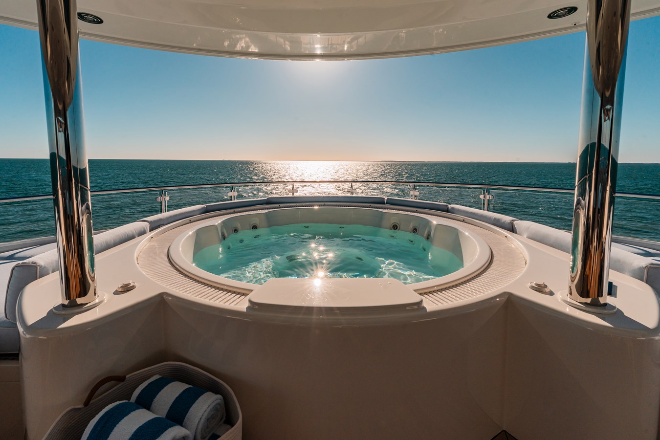 Westport 130 Blue Time sundeck jacuzzi at sunset off Fort Lauderdale