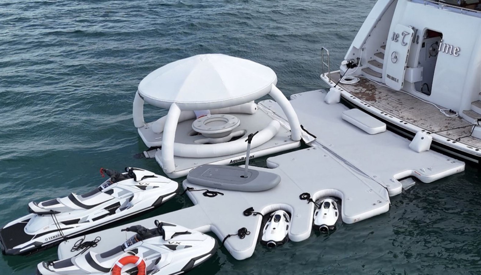 Westport 130 Blue Time water toys jet skis and AquaBanas inflatable platform