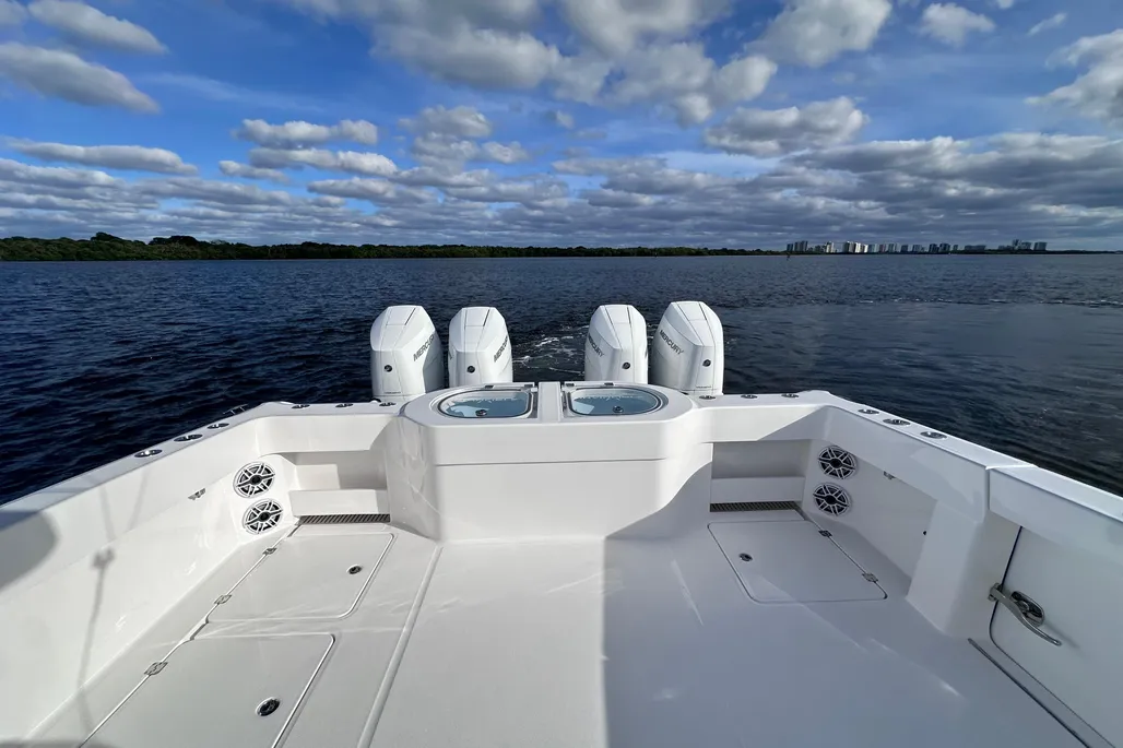 Invincible 40 Catamaran aft fishing cockpit with quad Mercury outboards and livewells