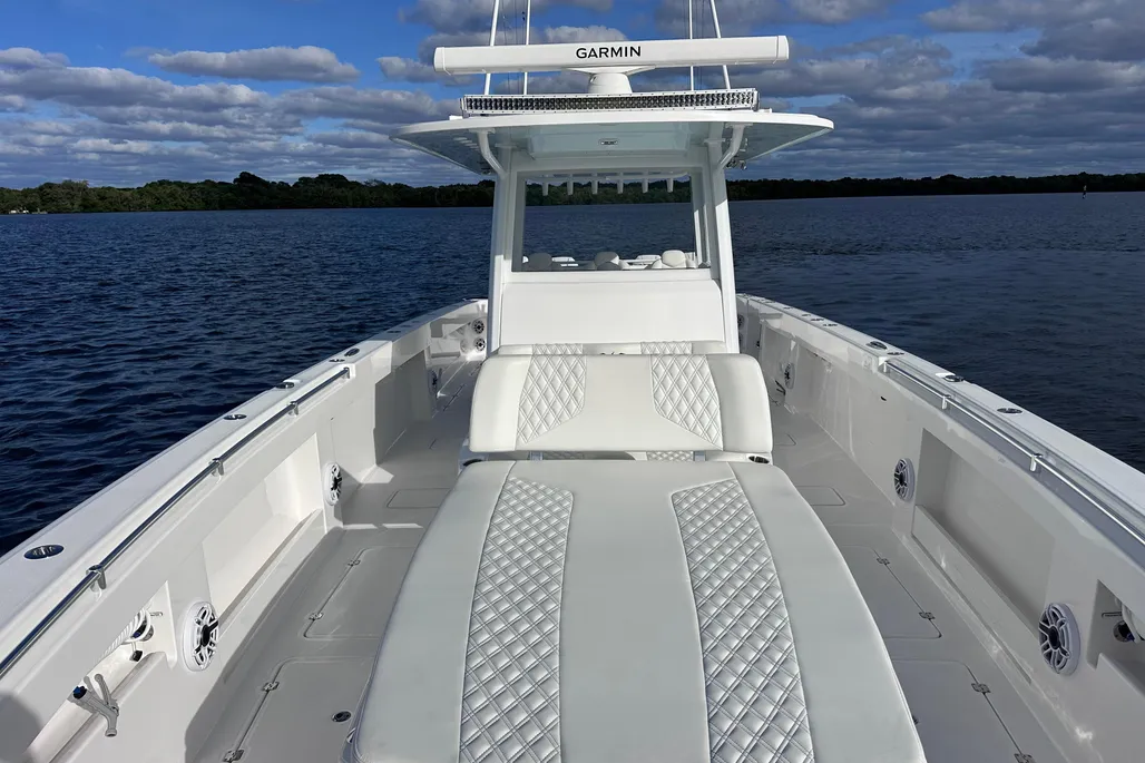 Invincible 40 Catamaran forward bow seating sun pad with Garmin hardtop