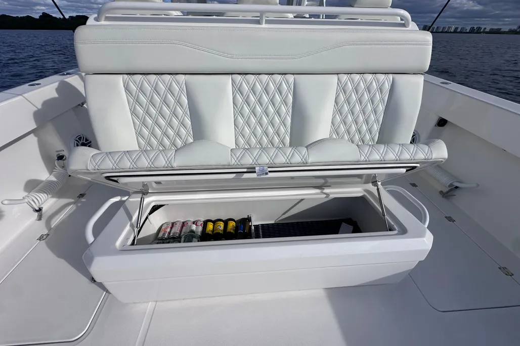 Invincible 40 Catamaran under-seat cooler refrigerator storage open