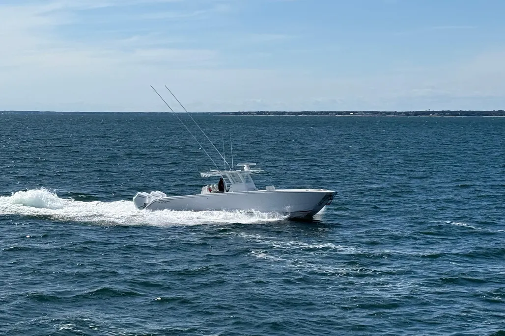 2025 Invincible 40 Catamaran running offshore in blue water South Florida