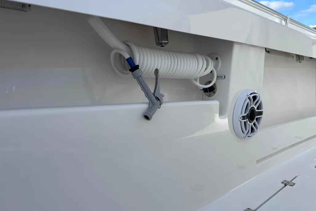 Invincible 40 Catamaran raw water washdown hose and JL Audio marine speaker