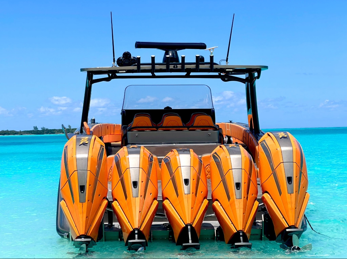 Midnight Express 43 Stop the Press aft view showing all five orange Mercury 450R outboards