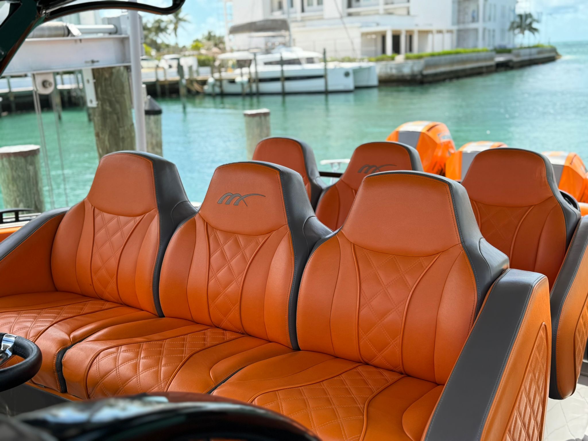 Midnight Express 43 Stop the Press triple orange quilted ME-branded helm seats with custom upholstery