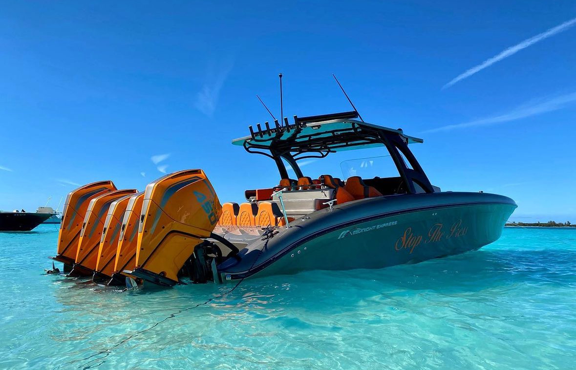 2021 Midnight Express 43 Open Stop the Press profile in crystal clear Bahamas water