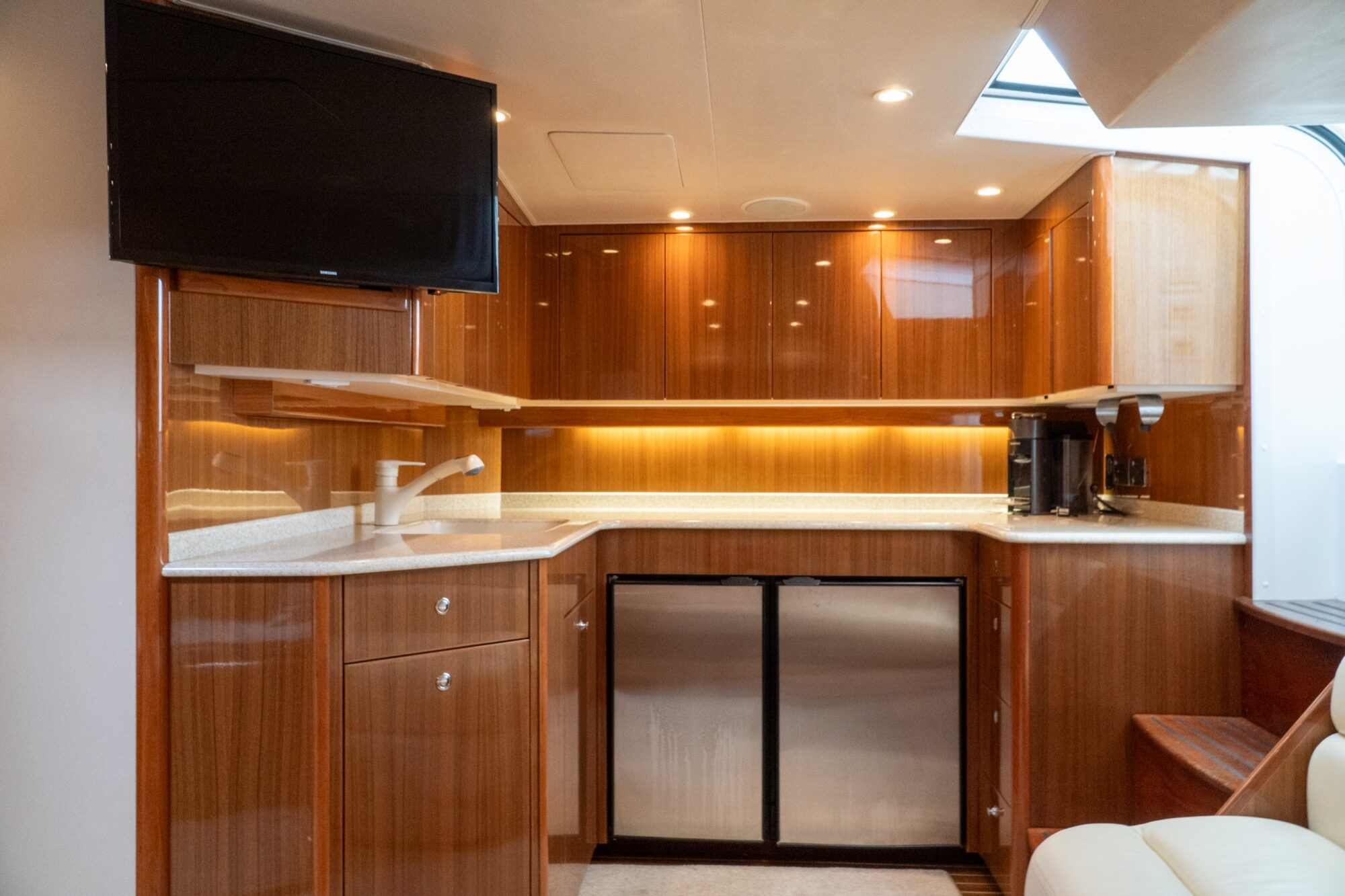 Viking 45 Open The Wroe Boat galley with teak cabinets TV and refrigerator