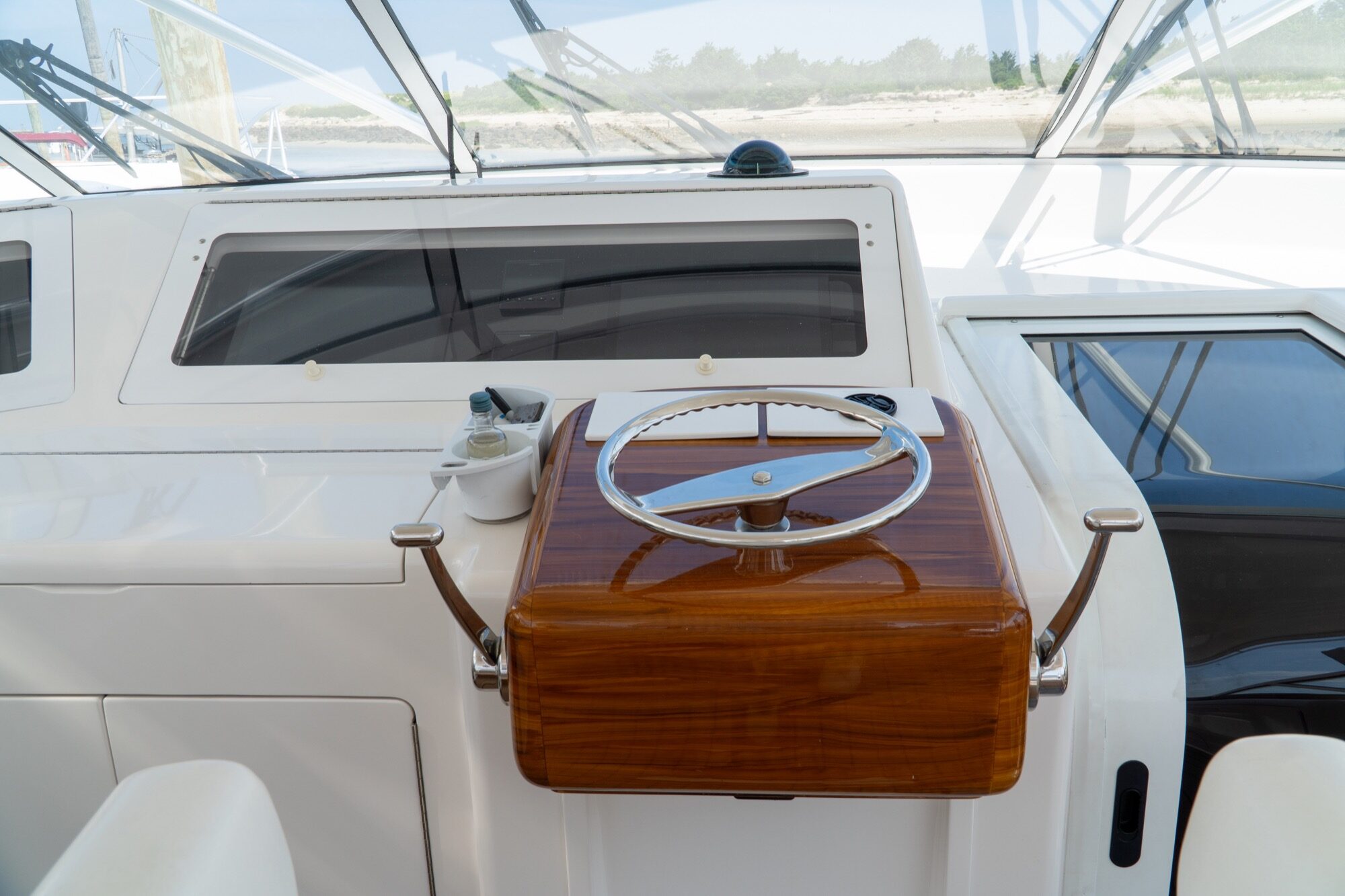 Viking 45 Open The Wroe Boat teak helm pod with wheel and electronics
