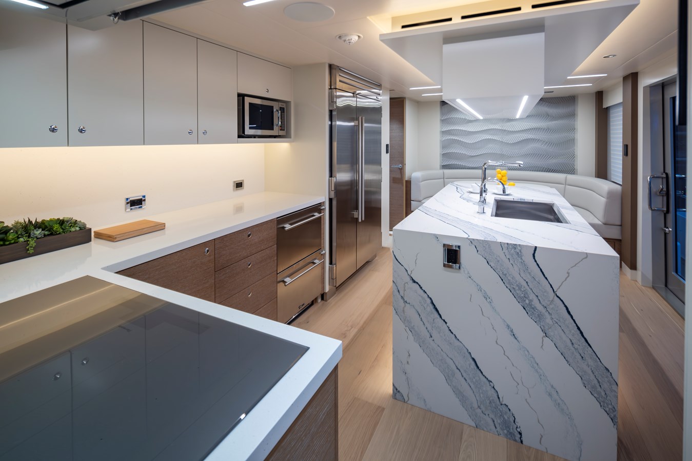 Westport W117 galley with marble waterfall island and professional appliances