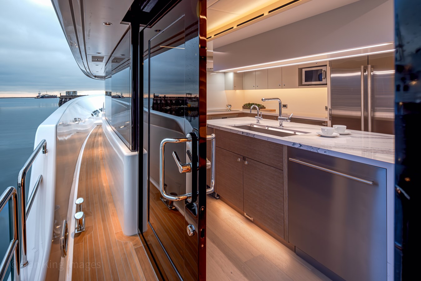 Westport W117 teak side deck looking into galley through glass door